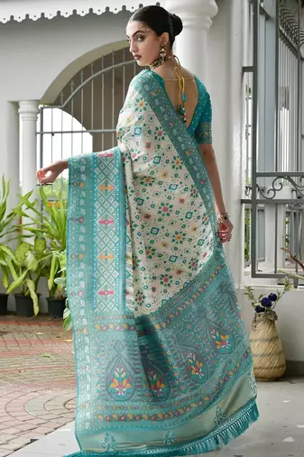 Sea green color banarasi silk blend ajhrakh meena zari weaving patola saree