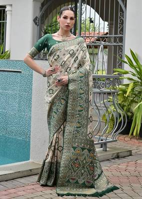 Green color banarasi silk blend ajhrakh meena zari weaving patola saree 1