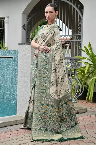 Green color banarasi silk blend ajhrakh meena zari weaving patola saree