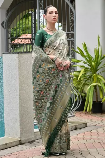 Green color banarasi silk blend ajhrakh meena zari weaving patola saree