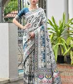 Rama blue color banarasi silk blend ajhrakh meena zari weaving patola saree