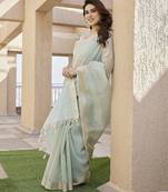 Pista color tissue linen zari weaving border saree with blouse