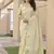 Yellow color tissue linen zari weaving border saree with blouse