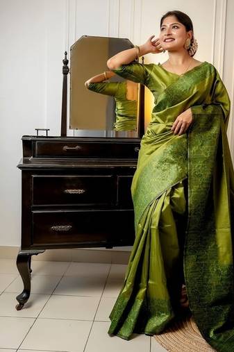Mehandi green color handloom raw silk weaving pallu saree