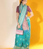 Sky blue color raw silk two tone weaving work saree