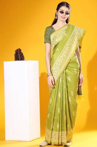 Green color raw silk two tone weaving work saree