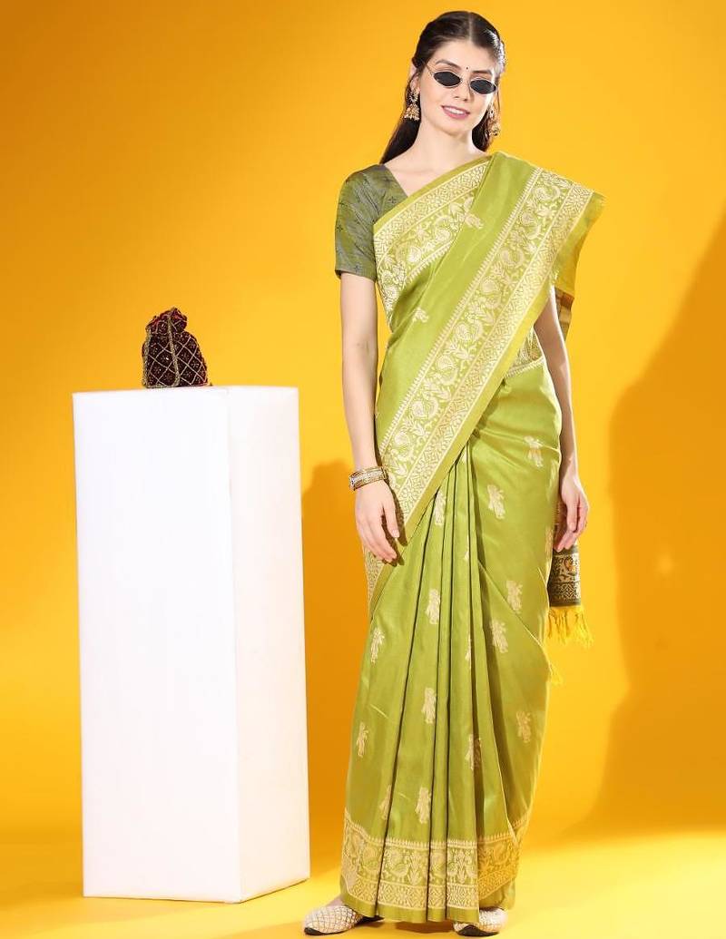 Green color raw silk two tone weaving work saree