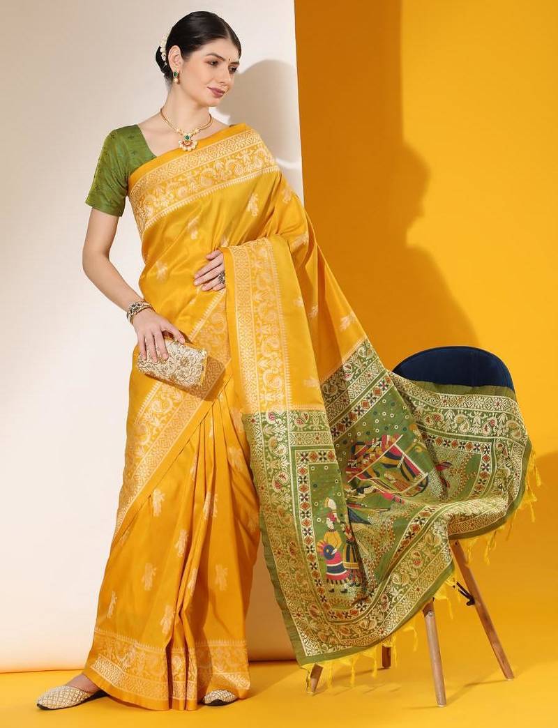 Musturd color raw silk two tone weaving work saree