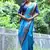 Sky blue color raw silk madhubani warli printed saree