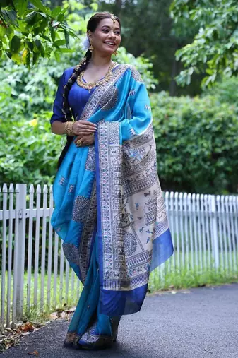 Sky blue color raw silk madhubani warli printed saree