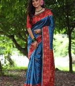 Blue color raw silk peacock printed saree