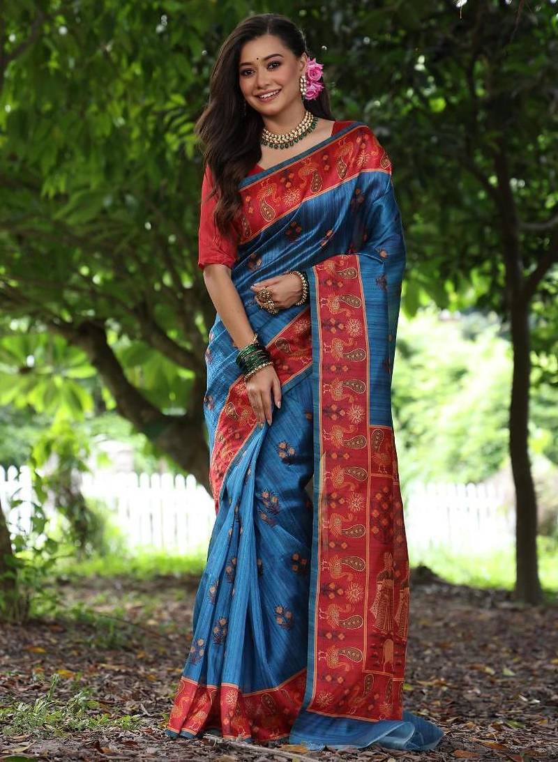 Blue color raw silk peacock printed saree