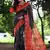 Black color raw silk peacock printed saree