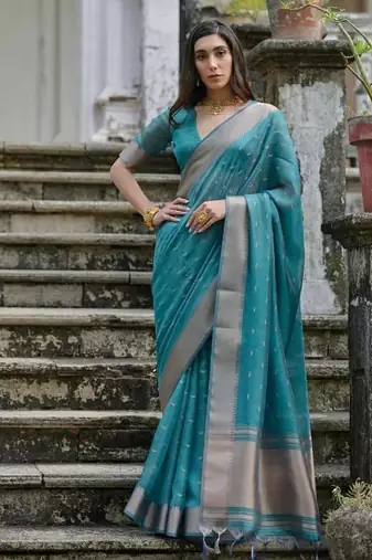 Green color kalyani silk blend zari weaving butti & border saree