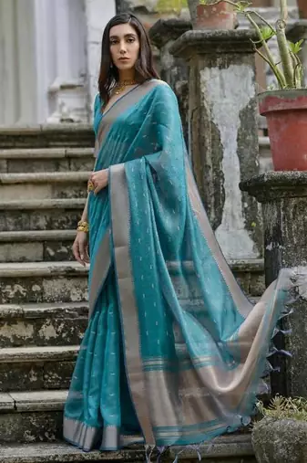 Green color kalyani silk blend zari weaving butti & border saree