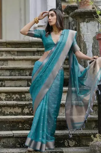 Green color kalyani silk blend zari weaving butti & border saree