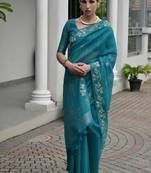 Sea green color linen jute silk blend zari weaves saree with blouse