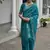 Sea green color linen jute silk zari weaves saree with blouse