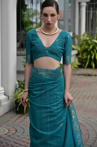 Sea green color linen jute silk blend zari weaves saree with blouse