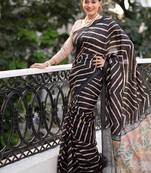 Black color tussar silk lehariya printed zari border saree