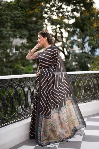 Black color tussar silk blend lehariya printed zari border saree