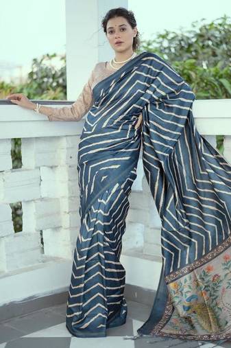 Aqua blue color tussar silk lehariya printed zari border saree