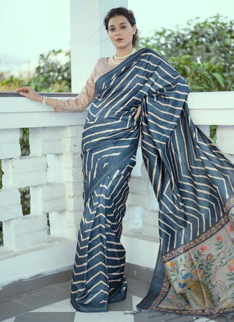 Aqua blue color tussar silk lehariya printed zari border saree