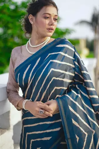 Aqua blue color tussar silk blend lehariya printed zari border saree
