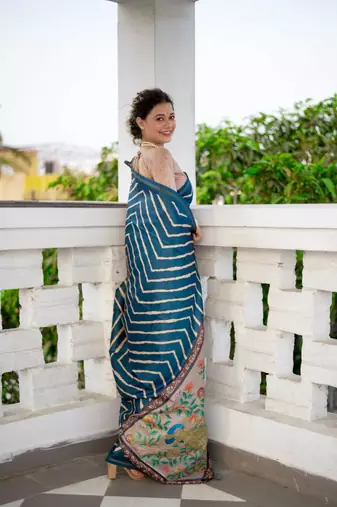 Aqua blue color tussar silk blend lehariya printed zari border saree