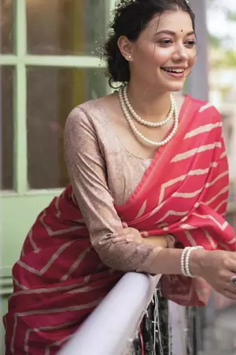 Gajri pink color tussar silk blend lehariya printed zari border saree