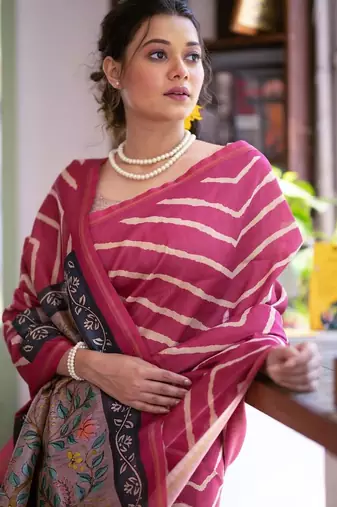 Pink color tussar silk blend lehariya printed zari border saree