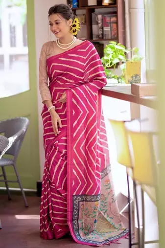 Pink color tussar silk blend lehariya printed zari border saree
