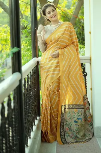 Yellow color tussar silk lehariya printed zari border saree