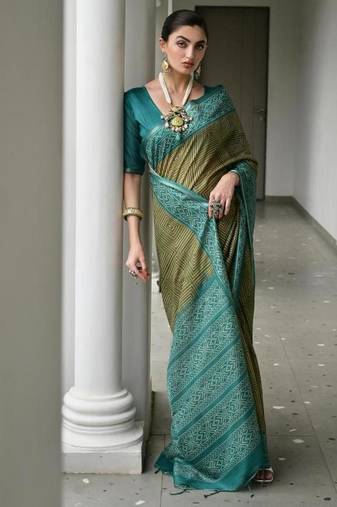 Mehendi color tussar silk ikkat printed saree