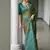 Mehendi color tussar silk ikkat printed saree