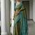 Mehendi color tussar silk ikkat printed saree
