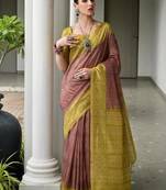 Brown color tussar silk blend ikkat printed saree