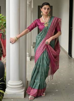 Green color tussar silk blend ikkat printed saree 1
