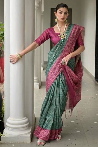 Green color tussar silk ikkat printed saree
