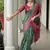 Green color tussar silk ikkat printed saree