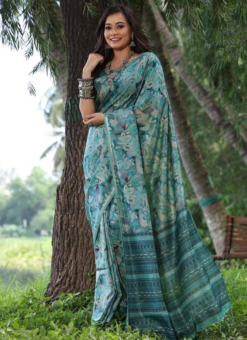 Sky blue color tussar silk unique print zari weaving border saree
