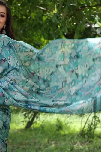 Sky blue color tussar silk unique print zari weaving border saree