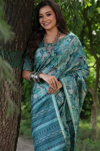 Sky blue color tussar silk unique print zari weaving border saree