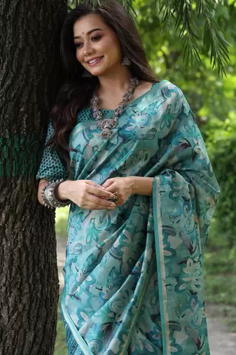 Sky blue color tussar silk unique print zari weaving border saree