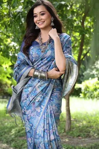 Blue color tussar silk blend unique print zari weaving border saree