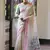 White & pink color muga cotton warli weaving pallu-border saree