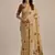 Beige color muga cotton flower concept weaving saree