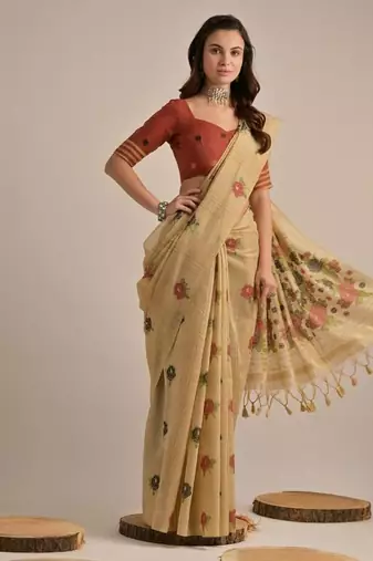 Beige color muga cotton flower concept weaving saree