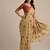 Beige color muga cotton flower concept weaving saree