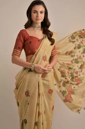 Beige color muga cotton flower concept weaving saree